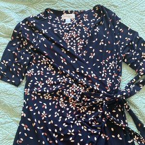 maternity wrap dress with 1/2 sleeves. approximately knee length.